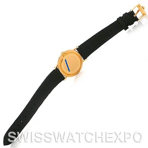 The Rolex Cellini 4112 Men's Yellow Gold Silver Dial 4112 Men's Yellow Gold Silver Dial watch is shown from a top-down angle, displaying the full face, straps, and clasp.