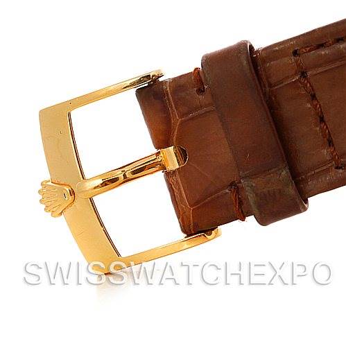 The image shows a close-up of the buckle and a portion of the leather strap of a Rolex Cellini 5116 Men's Yellow Gold Mother of Pearl Dial 5116 Men's Yellow Gold Mother of Pearl Dial watch.