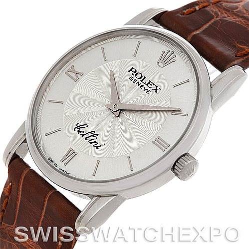 The image shows a close-up front view of a Rolex Cellini 5116 Men's White Gold Silver Dial 5116 Men's White Gold Silver Dial watch featuring its face, crown, and part of the brown leather strap.