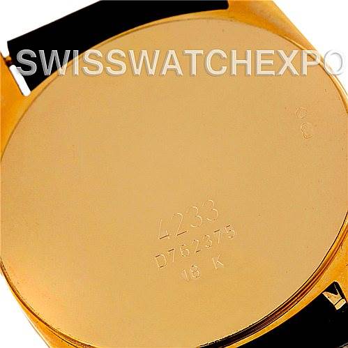 This image shows the back case of a Rolex Cellini 4233 Men's Yellow Gold White Dial 4233 Men's Yellow Gold White Dial model watch, featuring a gold finish and engraved details.