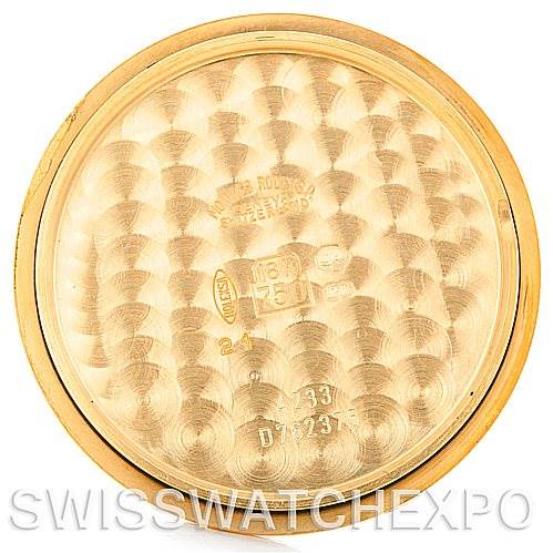 This image shows the case back interior of a Rolex Cellini 4233 Men's Yellow Gold White Dial 4233 Men's Yellow Gold White Dial watch, highlighting its engravings and gold tone.