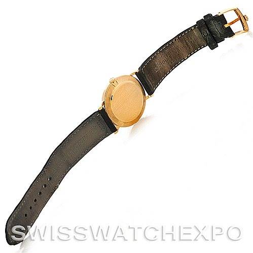 The image shows the back view of a Rolex Cellini 5112 Men's Yellow Gold Beige Dial 5112 Men's Yellow Gold Beige Dial watch with its strap fully extended.