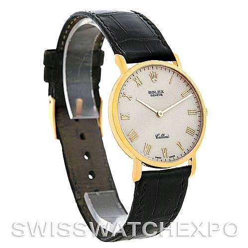 The image shows a side angle of the Rolex Cellini 5112 Men's Yellow Gold Beige Dial 5112 Men's Yellow Gold Beige Dial watch, highlighting its face, black leather strap, and gold casing.