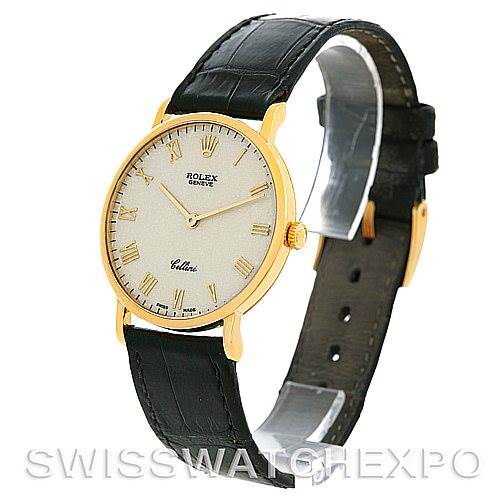 The image shows a Rolex Cellini 5112 Men's Yellow Gold Beige Dial 5112 Men's Yellow Gold Beige Dial watch at an angle displaying the front dial, gold case, and black leather strap.