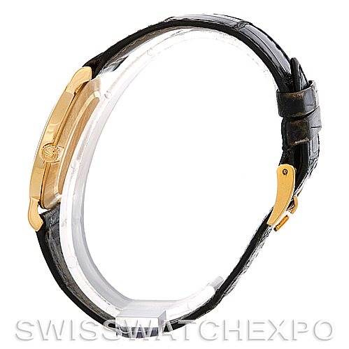 This image shows a Rolex Cellini 5112 Men's Yellow Gold Beige Dial 5112 Men's Yellow Gold Beige Dial watch from the side, highlighting its gold bezel and black leather strap.