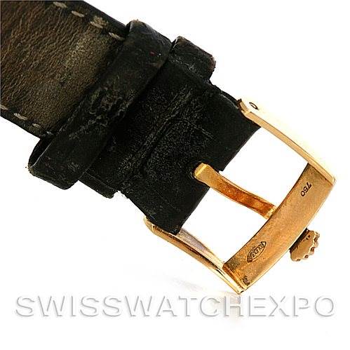 The image shows a close-up angle of the clasp and part of the leather strap of a Rolex Cellini 5112 Men's Yellow Gold Beige Dial 5112 Men's Yellow Gold Beige Dial watch.