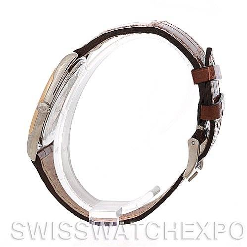 The image shows a Rolex Cellini 4233 Men's White Gold Black Dial 4233 Men's White Gold Black Dial watch from a side angle, highlighting its case, crown, and brown leather strap with a buckle.