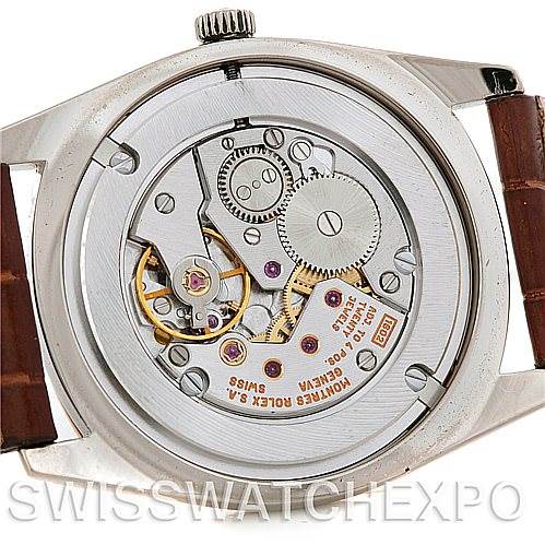 The image shows the back view of a Rolex Cellini 4233 Men's White Gold Black Dial 4233 Men's White Gold Black Dial watch, revealing its mechanical movement and internal components.