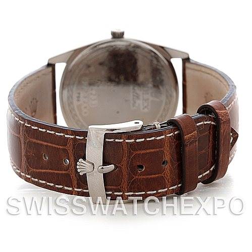 The image shows the back of the Rolex Cellini 4233 Men's White Gold Black Dial 4233 Men's White Gold Black Dial watch, focusing on the brown leather strap and silver buckle with the Rolex logo.