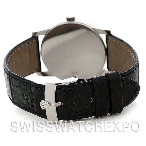 The image shows the back view of a Rolex Cellini 5116 Men's White Gold Black Dial 5116 Men's White Gold Black Dial watch, highlighting its leather strap and clasp with the Rolex crown logo.