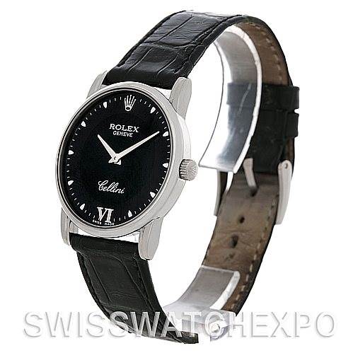 The image shows a Rolex Cellini 5116 Men's White Gold Black Dial 5116 Men's White Gold Black Dial watch at an angled side view, highlighting the face, strap, and clasp.