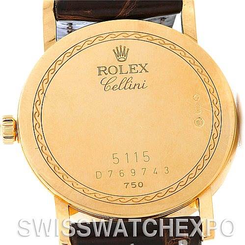 The image shows the back of a Rolex Cellini 5115 Men's Yellow Gold Silver Dial 5115 Men's Yellow Gold Silver Dial watch, displaying the case, crown, and engraved model information.