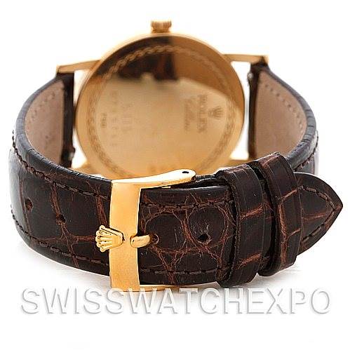 The image shows the back view of the Rolex Cellini 5115 Men's Yellow Gold Silver Dial 5115 Men's Yellow Gold Silver Dial watch, featuring the leather strap and gold clasp.