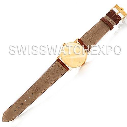 The image shows a top-down view of the Rolex Cellini 5115 Men's Yellow Gold Grey Dial 5115 Men's Yellow Gold Grey Dial watch, revealing the face, leather strap, and buckle.