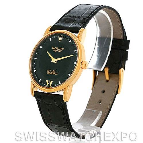This image shows a side and front angle of the Rolex Cellini 5116 Men's Yellow Gold Black Dial 5116 Men's Yellow Gold Black Dial watch, featuring a leather strap and a gold-colored case.