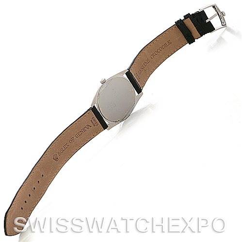 The image shows the back view of a Rolex Cellini 4233 Men
s White Gold Black Dial 4233 Men
s White Gold Black Dial watch, highlighting its leather strap and buckle.