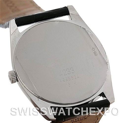 This image shows the back case and part of the strap of a Rolex Cellini 4233 Men
s White Gold Black Dial 4233 Men
s White Gold Black Dial watch.