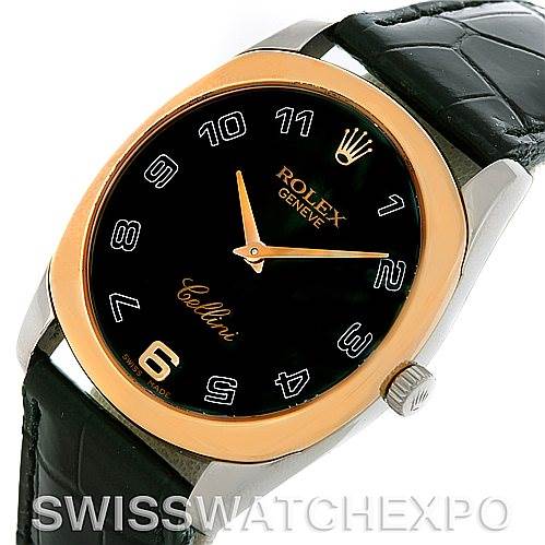 This image shows a Rolex Cellini 4233 Men
s White Gold Black Dial 4233 Men
s White Gold Black Dial watch featuring its black dial, gold bezel, numerals, hands, crown, and a black leather strap.