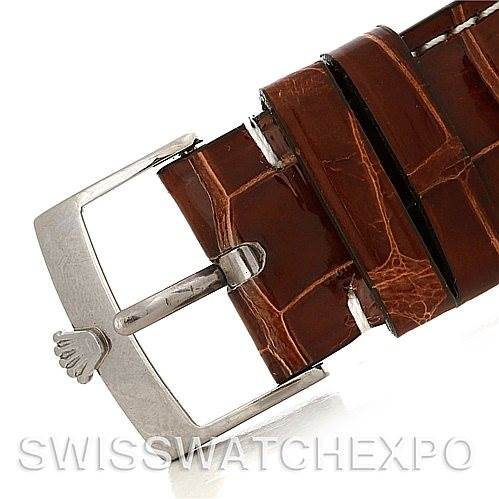 This image shows the brown leather strap and silver buckle of a Rolex Cellini 4233 Men's White Gold Black Dial 4233 Men's White Gold Black Dial watch.