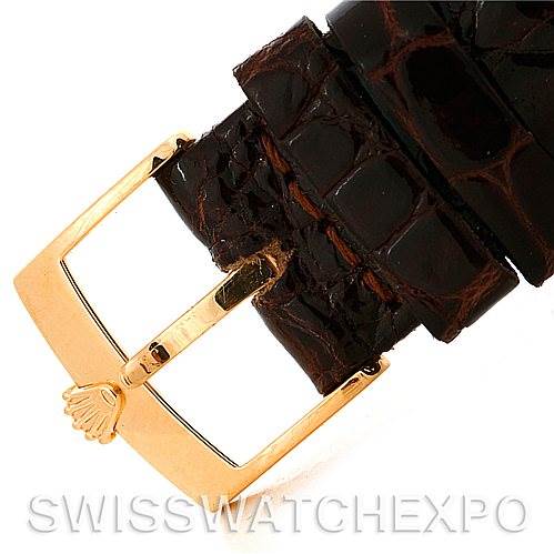 This image shows a close-up of the buckle and leather strap of a Rolex Cellini 5115 Men's Yellow Gold Beige Dial 5115 Men's Yellow Gold Beige Dial watch.