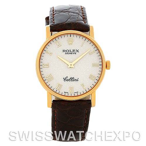 The image shows a front view of a Rolex Cellini 5115 Men's Yellow Gold Beige Dial 5115 Men's Yellow Gold Beige Dial watch, featuring a gold case, white dial, Roman numerals, and a brown leather strap.