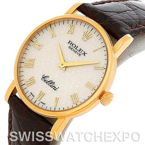 The image shows a close-up angled view of the Rolex Cellini 5115 Men's Yellow Gold Beige Dial 5115 Men's Yellow Gold Beige Dial watch face, gold bezel, and brown leather strap.