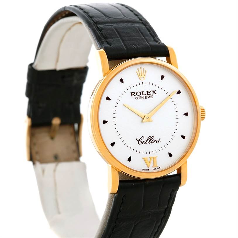 The Rolex Cellini 5115 Men's Yellow Gold Silver Dial 5115 Men's Yellow Gold Silver Dial watch is shown at a front angle, highlighting its white dial, gold case, and black leather strap.