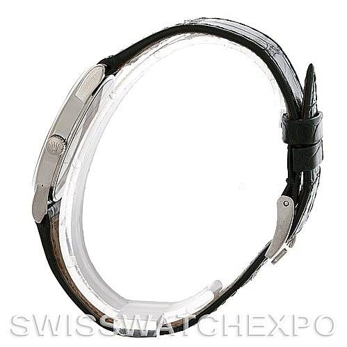 This image shows a side view of a Rolex Cellini 5116 Men's White Gold Silver Dial 5116 Men's White Gold Silver Dial watch featuring its bezel, case, and leather strap.