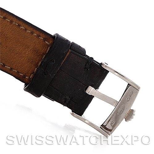 The image shows a close-up of the black leather strap and silver buckle of a Rolex Cellini 5116 Men's White Gold Silver Dial 5116 Men's White Gold Silver Dial watch.