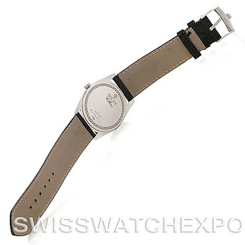The image shows the back of a Rolex Cellini 4233 Men's White Gold Black Dial 4233 Men's White Gold Black Dial watch, including the case back, leather strap, and buckle, viewed from an angled top-down perspective.