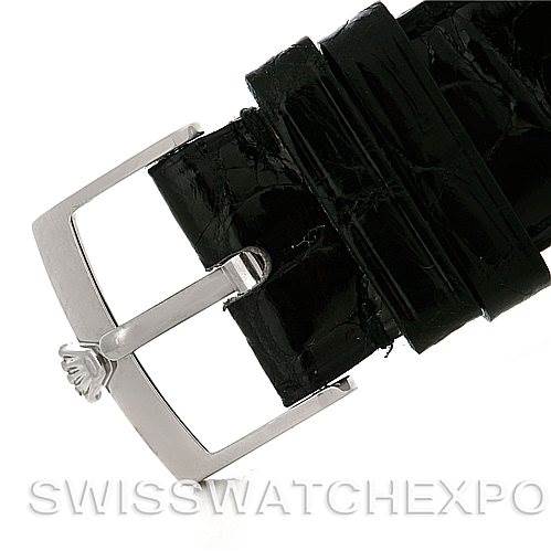 The image shows a close-up of a Rolex Cellini 4233 Men's White Gold Black Dial 4233 Men's White Gold Black Dial watch strap and its metal buckle.
