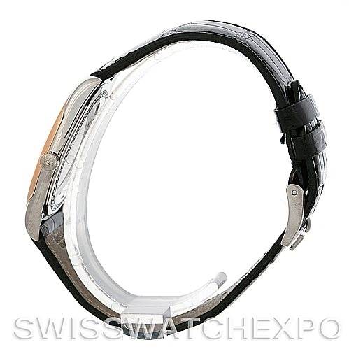 The image shows the side view of a Rolex Cellini 4233 Men's White Gold Black Dial 4233 Men's White Gold Black Dial watch, highlighting the case, crown, and leather strap.