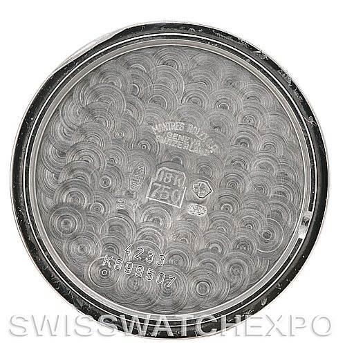 This is an image of the back case interior of a Rolex Cellini 4233 Men's White Gold White Dial 4233 Men's White Gold White Dial watch, showing the case reference numbers and hallmark stamps.