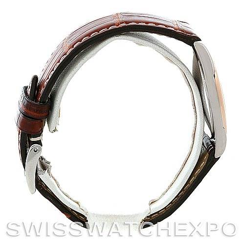 The watch, a Rolex Cellini 4233 Men's White Gold Black Dial 4233 Men's White Gold Black Dial model, is shown from a side angle displaying its brown leather strap and side profile of the case.