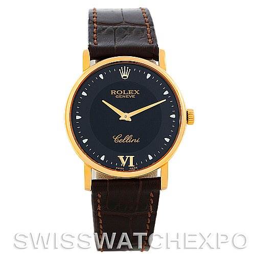 The image shows a front view of a Rolex Cellini 5115 Men's Yellow Gold Black Dial 5115 Men's Yellow Gold Black Dial watch, highlighting its face, crown, and leather strap.