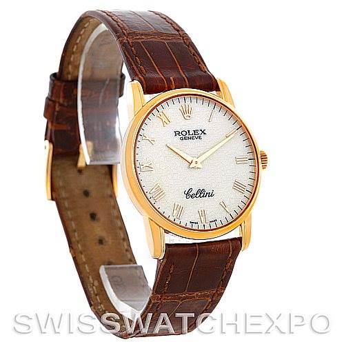 The image shows a Rolex Cellini 5116 Men
s Yellow Gold Beige Dial 5116 Men
s Yellow Gold Beige Dial watch at a slight angle, highlighting its face, leather strap, and gold casing.