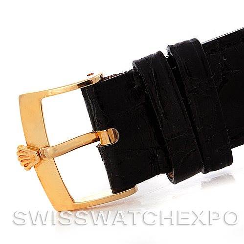 This image shows a close-up of the buckle and leather strap of a Rolex Cellini 4233 Men's Yellow Gold Black Dial 4233 Men's Yellow Gold Black Dial watch.