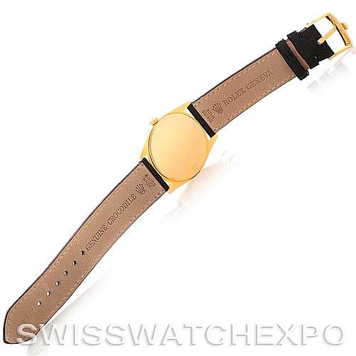 The image shows the back view of a Rolex Cellini 4233 Men's Yellow Gold Black Dial 4233 Men's Yellow Gold Black Dial model watch, highlighting its leather strap and buckle.