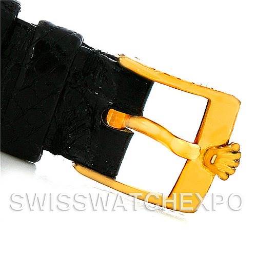 The image shows a close-up of the gold buckle and part of the black leather strap of a Rolex Cellini 4015 Men's Yellow Gold White Dial 4015 Men's Yellow Gold White Dial watch.