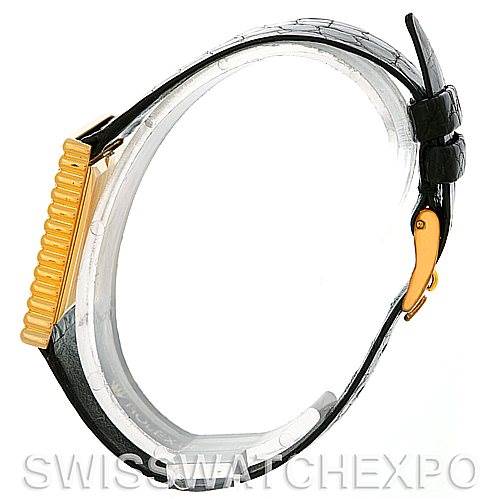 This Rolex Cellini 4015 Men's Yellow Gold White Dial 4015 Men's Yellow Gold White Dial watch is shown in a side profile view, displaying its strap and clasp.