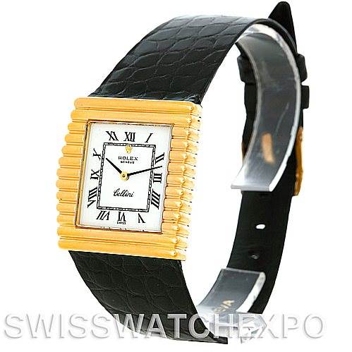 The image shows a Rolex Cellini 4015 Men's Yellow Gold White Dial 4015 Men's Yellow Gold White Dial watch with a gold rectangular case, a leather strap, and a white dial with Roman numerals.
