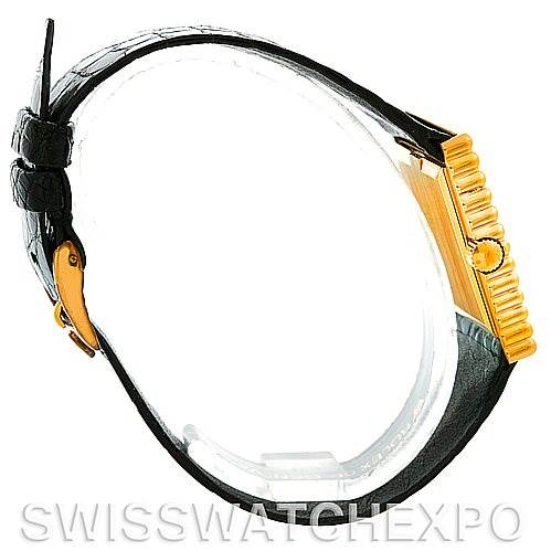 The image shows a side view of a Rolex Cellini 4015 Men's Yellow Gold White Dial 4015 Men's Yellow Gold White Dial model watch, highlighting its black strap, gold case, and crown.