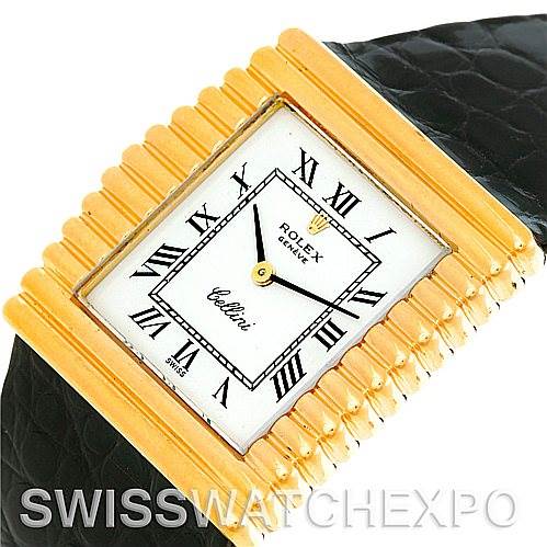 The image shows the face and bezel of a Rolex Cellini 4015 Men's Yellow Gold White Dial 4015 Men's Yellow Gold White Dial watch with a gold rectangular case and black leather strap.