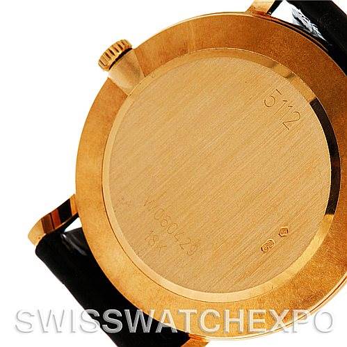 This image shows the back and part of the crown of a Rolex Cellini 5112 Men's Yellow Gold White Dial 5112 Men's Yellow Gold White Dial watch.