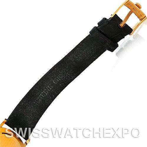 The image shows the black leather strap and gold buckle of a Rolex Cellini 5112 Men's Yellow Gold White Dial 5112 Men's Yellow Gold White Dial watch from a top angle.