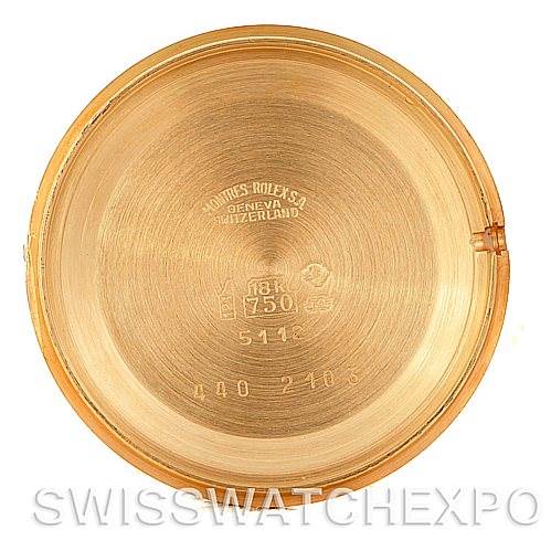 This image shows the inner case back of a Rolex Cellini 5112 Men's Yellow Gold White Dial 5112 Men's Yellow Gold White Dial watch, highlighting engravings and hallmarks.