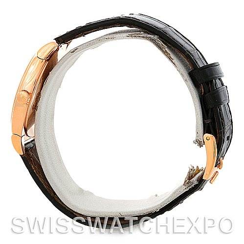 The image shows a side view of a Rolex Cellini 5320/5 Rose Gold Grey Dial 5320/5 Rose Gold Grey Dial watch, highlighting its black leather strap and gold clasp.