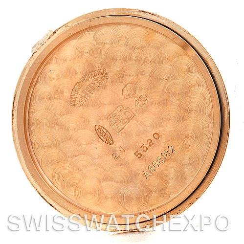 This image shows the interior case back of a Rolex Cellini 5320/5 Rose Gold Grey Dial 5320/5 Rose Gold Grey Dial watch, displaying engravings and hallmarks.