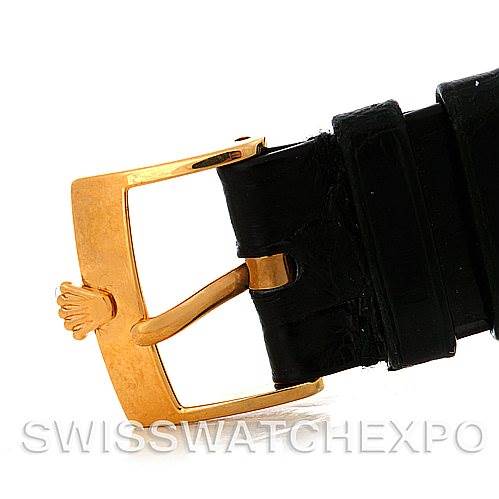 This image shows a close-up of the buckle and strap of a Rolex Cellini 5115 Men's Yellow Gold Black Dial 5115 Men's Yellow Gold Black Dial watch.