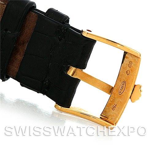 This image shows the gold buckle and black leather strap of a Rolex Cellini 5115 Men's Yellow Gold Black Dial 5115 Men's Yellow Gold Black Dial watch at an angle.